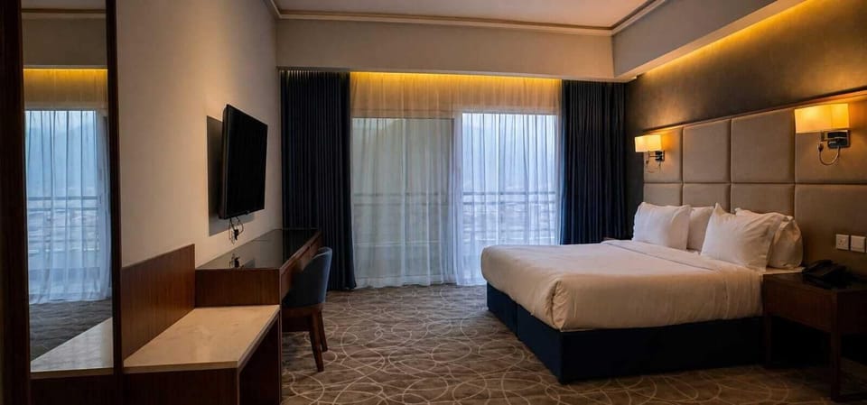 Family Suite, Balcony, Mountain View | In-room safe, blackout drapes, soundproofing, iron/ironing board