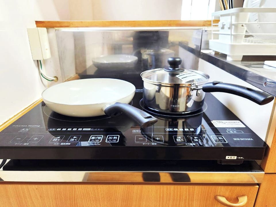 Fridge, microwave, dining table