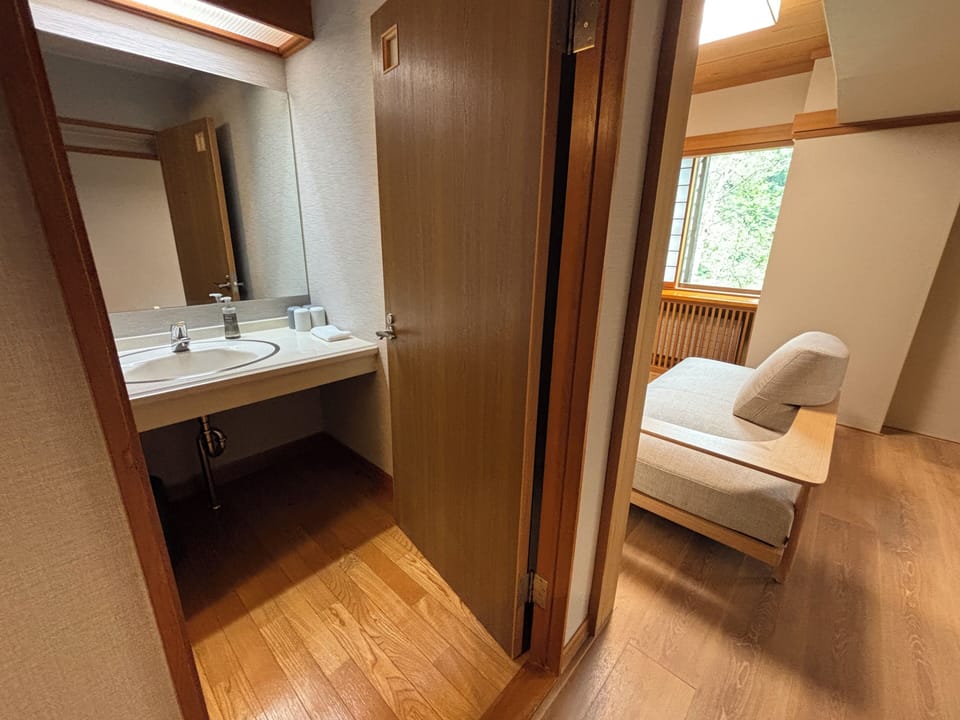 Family Room | Bathroom | Hair dryer, slippers, bidet, towels