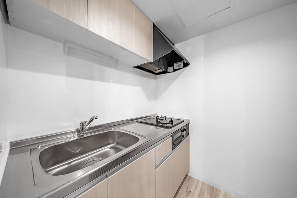Apartment | Private kitchen | Fridge, microwave, stovetop, cookware/dishes/utensils