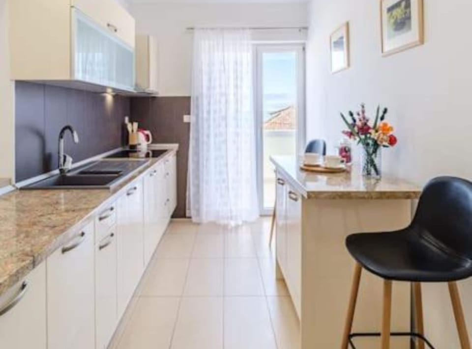 Apartment (Three Bedroom Apartment with Sea View) | Private kitchen | Fridge