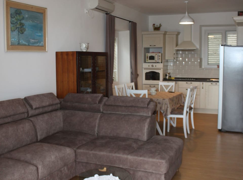 Apartment (Three Bedroom Apartment with Sea View) | Living room | 32-inch flat-screen TV with satellite channels