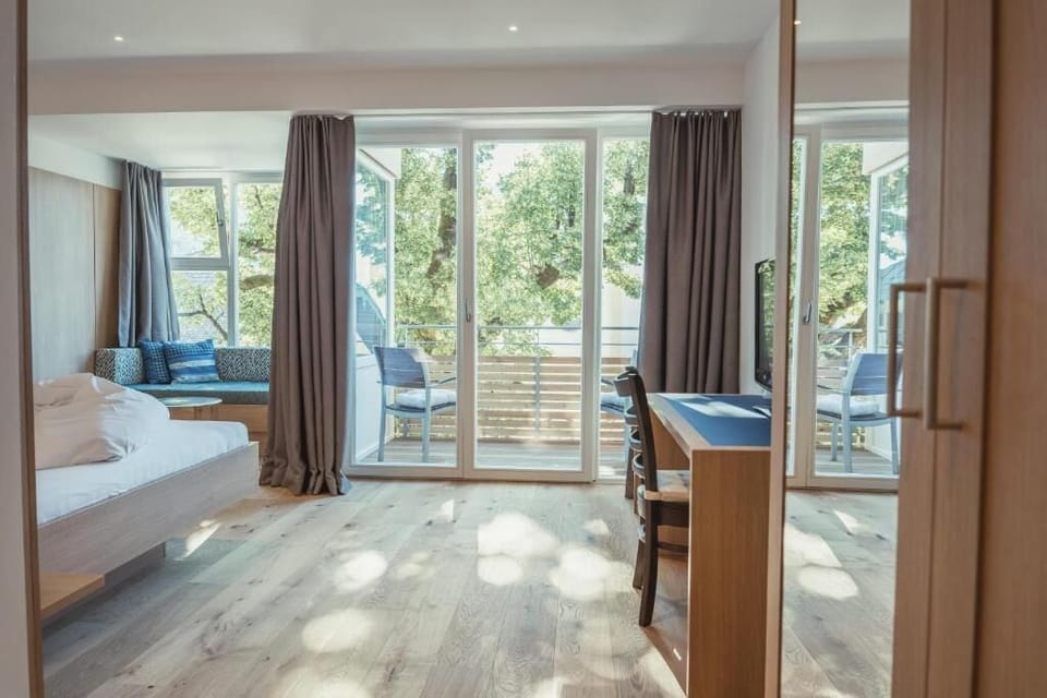 Deluxe Double Room, Balcony, Mountain View | In-room safe, desk, blackout drapes, iron/ironing board