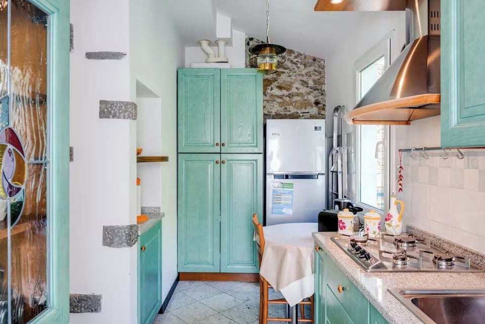 Apartment | Private kitchen | Full-size fridge, oven, stovetop, cookware/dishes/utensils
