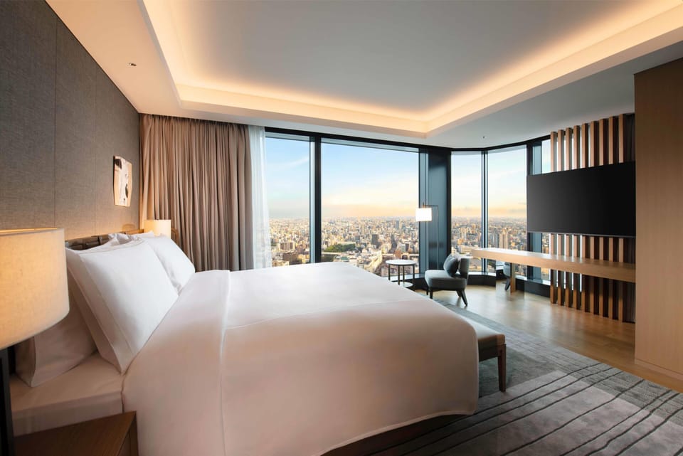 Premium Suite, 1 King Bed, Corner | Down comforters, minibar, in-room safe, blackout drapes