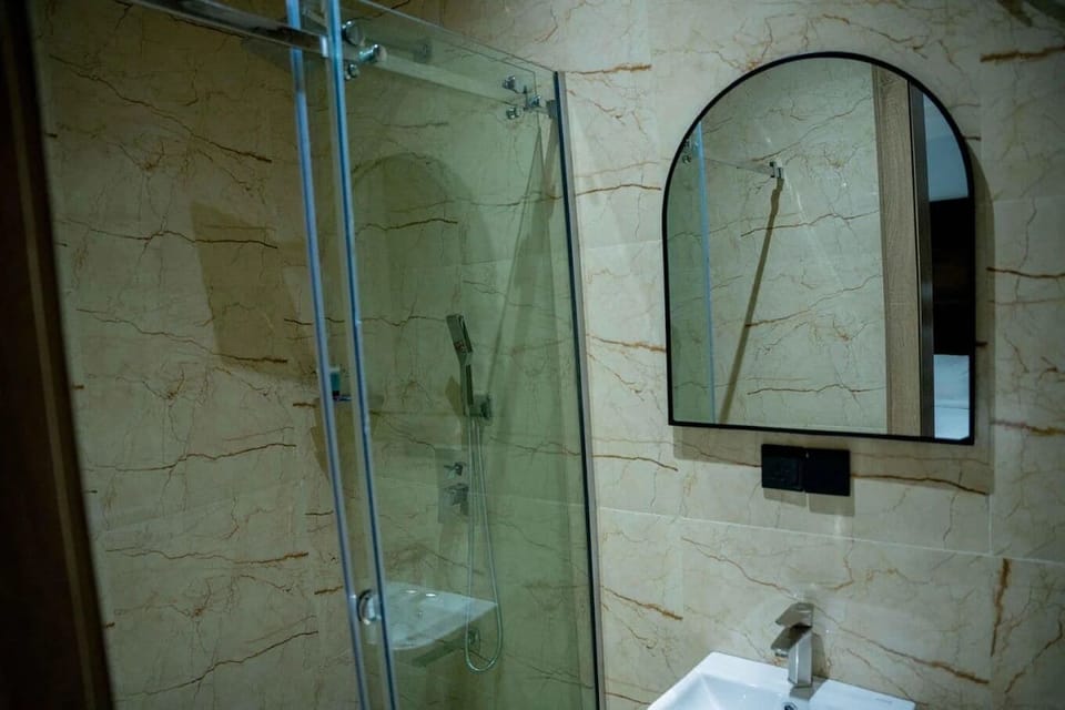 Economy Room, Balcony, City View | Bathroom | Free toiletries, towels, soap, shampoo