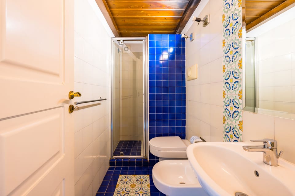 Deluxe Double Room, Sea View | Bathroom | Shower, hair dryer, towels, soap