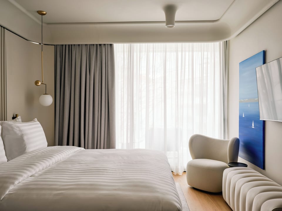 Superior Room, 1 King Bed | In-room safe, iron/ironing board, WiFi (free), bed sheets