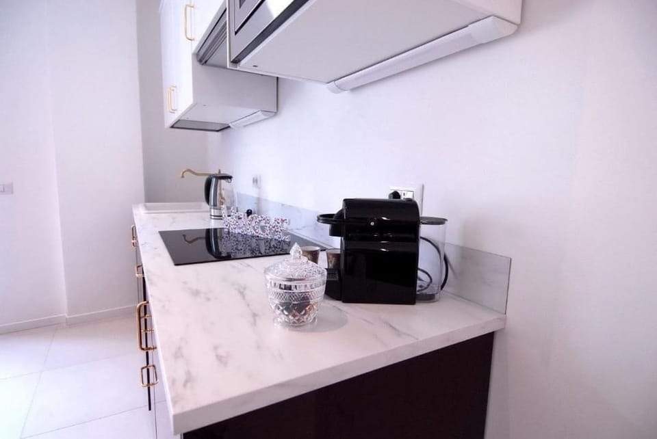Superior Apartment, Balcony, Tower | Private kitchen | Espresso maker, coffee/tea maker, electric kettle, dining tables