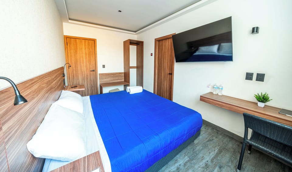 Premium bedding, memory foam beds, desk, laptop workspace