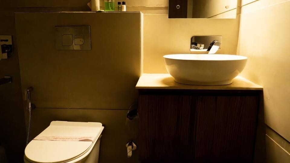 Shower, hair dryer, slippers, towels