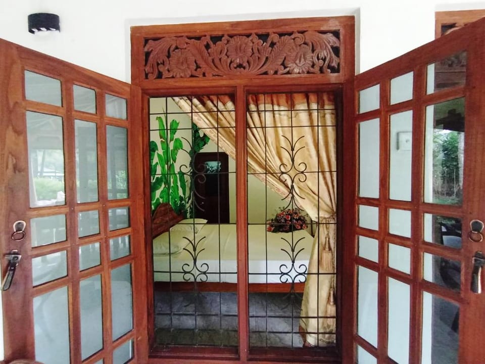 Comfort Double Room, Garden View | In-room safe, desk, laptop workspace, soundproofing