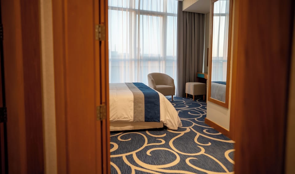 Deluxe Room, City View, Tower | Down comforters, pillowtop beds, minibar, in-room safe