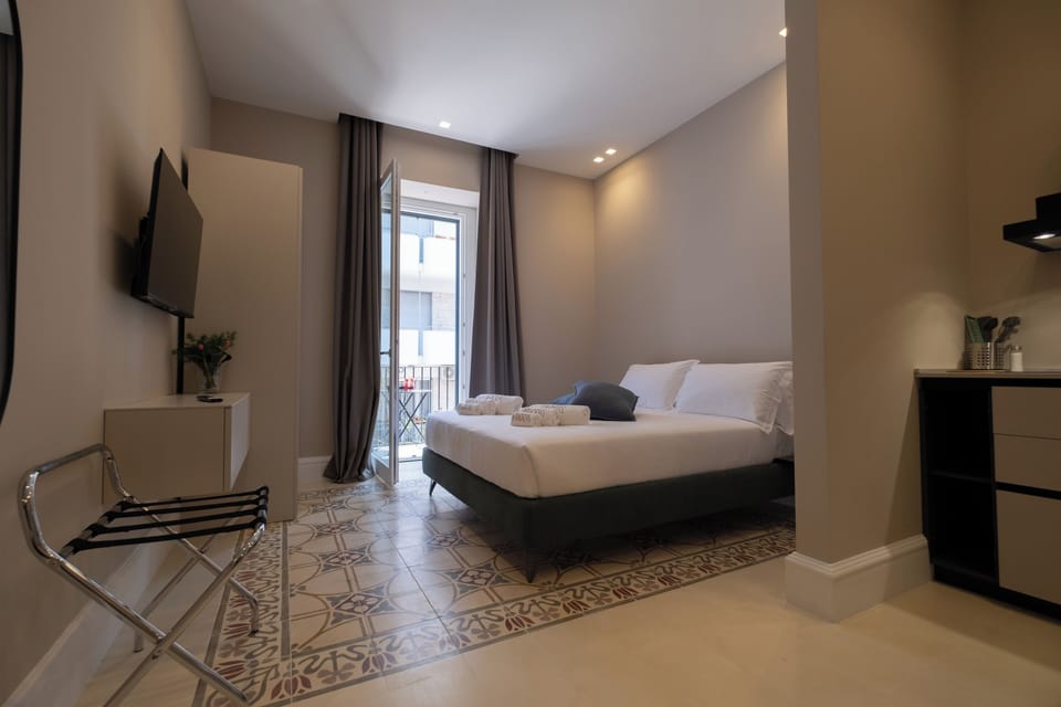 Deluxe Apartment, Balcony, City View | Blackout drapes, soundproofing, iron/ironing board, WiFi (free)