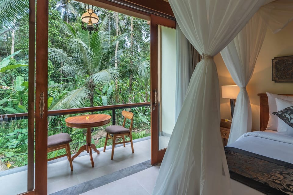 Deluxe Room, Balcony, Garden View | Select Comfort beds, in-room safe, desk, laptop workspace