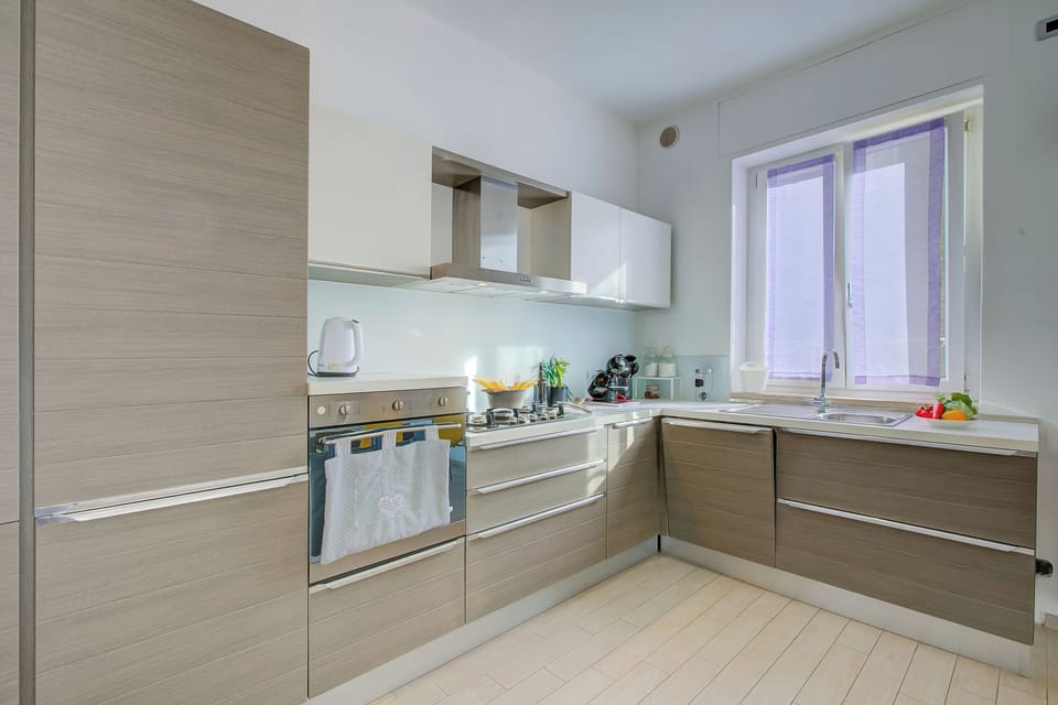 Family Apartment, 2 Bedrooms, Balcony (Asia Apartment Laveno Center) | Private kitchen