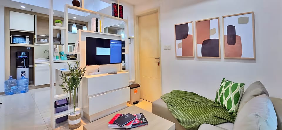 Apartment, 2 Bedrooms, City View | Living area | 43-inch Smart TV with cable channels