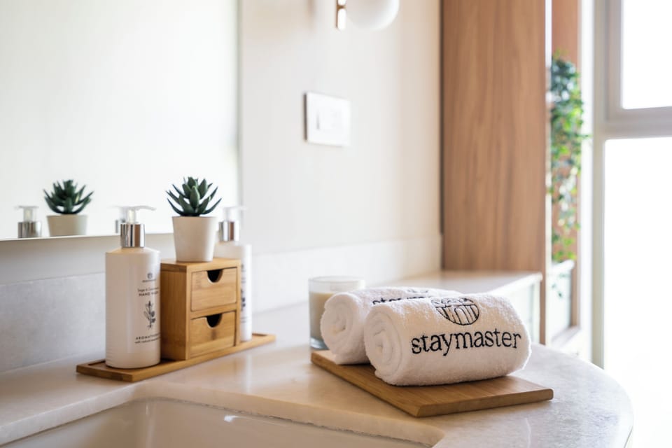 Shower, towels, soap, shampoo