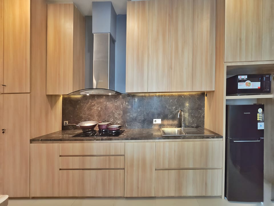 Apartment, 2 Bedrooms, City View | Private kitchen | Fridge, microwave, stovetop, cookware/dishes/utensils
