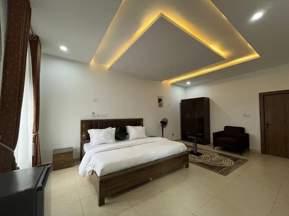 Family Room, Balcony, City View | Desk, laptop workspace, blackout drapes, soundproofing