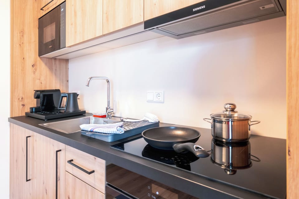 Apartment | Private kitchen | Full-size fridge, microwave, oven, stovetop