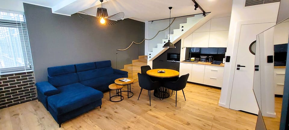 (310) Two-Level River View Apartment with 1 Bedroom | Individually furnished, desk, laptop workspace, soundproofing