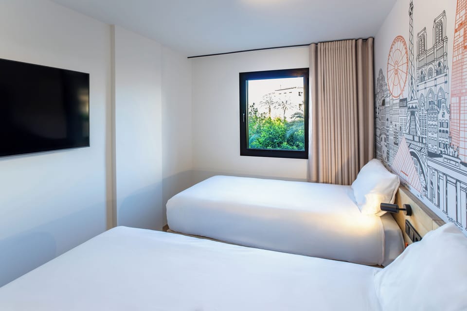 Twin Room | Memory foam beds, desk, laptop workspace, blackout drapes