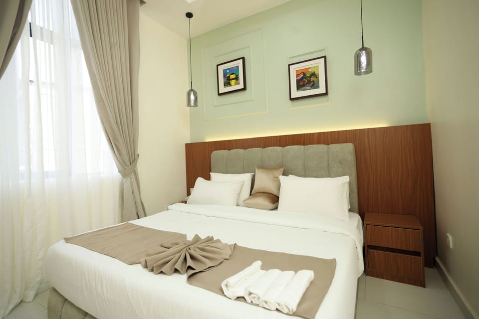 Deluxe Room, Balcony, City View | Desk, laptop workspace, free WiFi