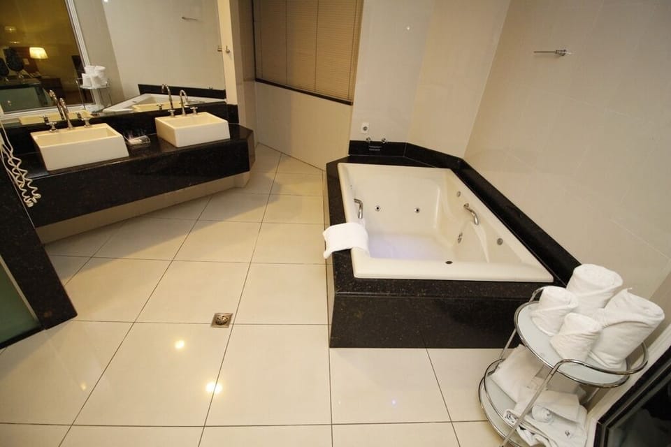 Superior Room | Bathroom | Shower, hair dryer, towels, soap