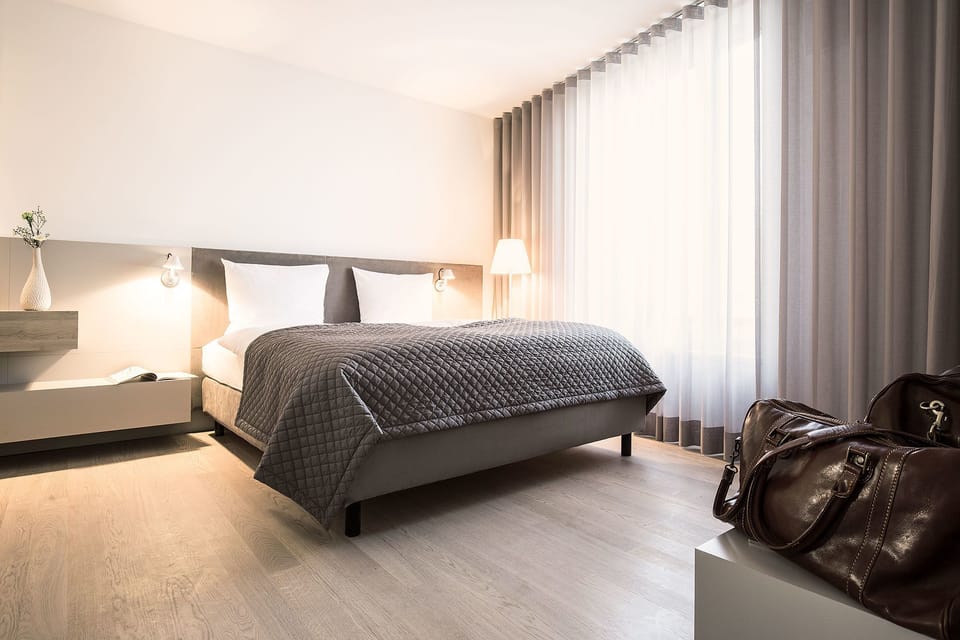 Junior Suite, 1 Bedroom | Hypo-allergenic bedding available, down comforters, in-room safe, desk