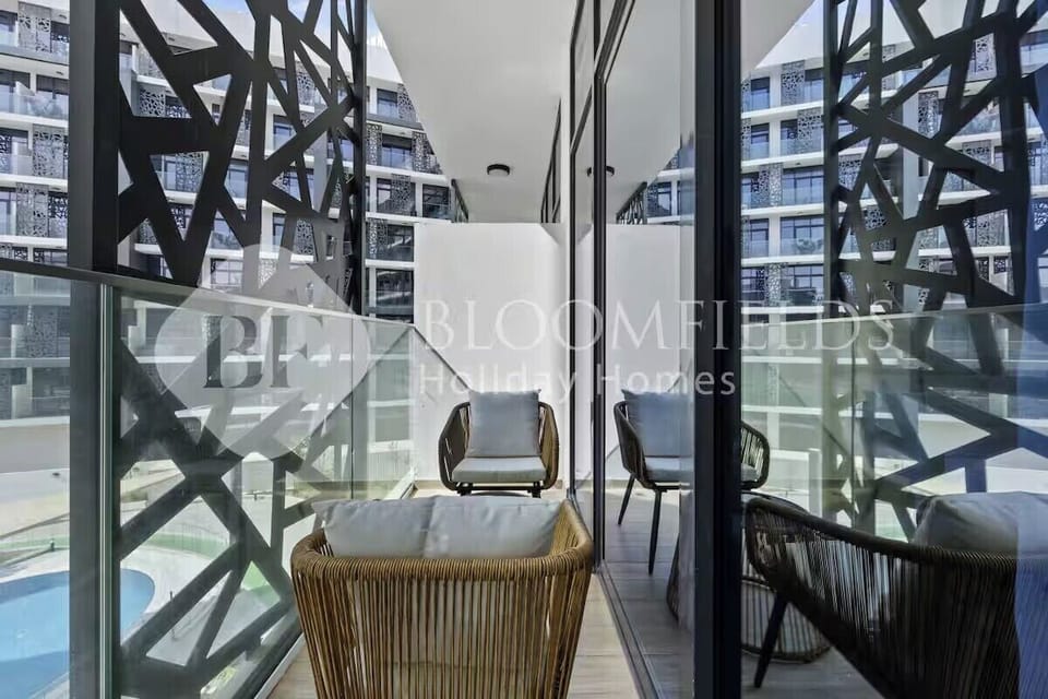 Apartment, Balcony, Pool View | Property grounds
