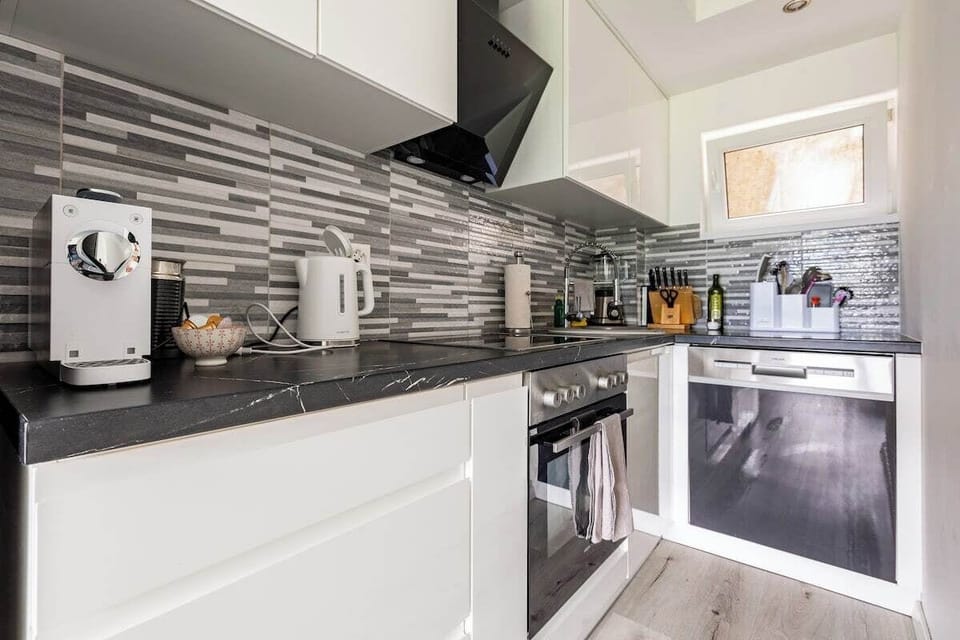 Deluxe Condo, Mountain View | Private kitchen | Microwave, espresso maker, coffee/tea maker, electric kettle