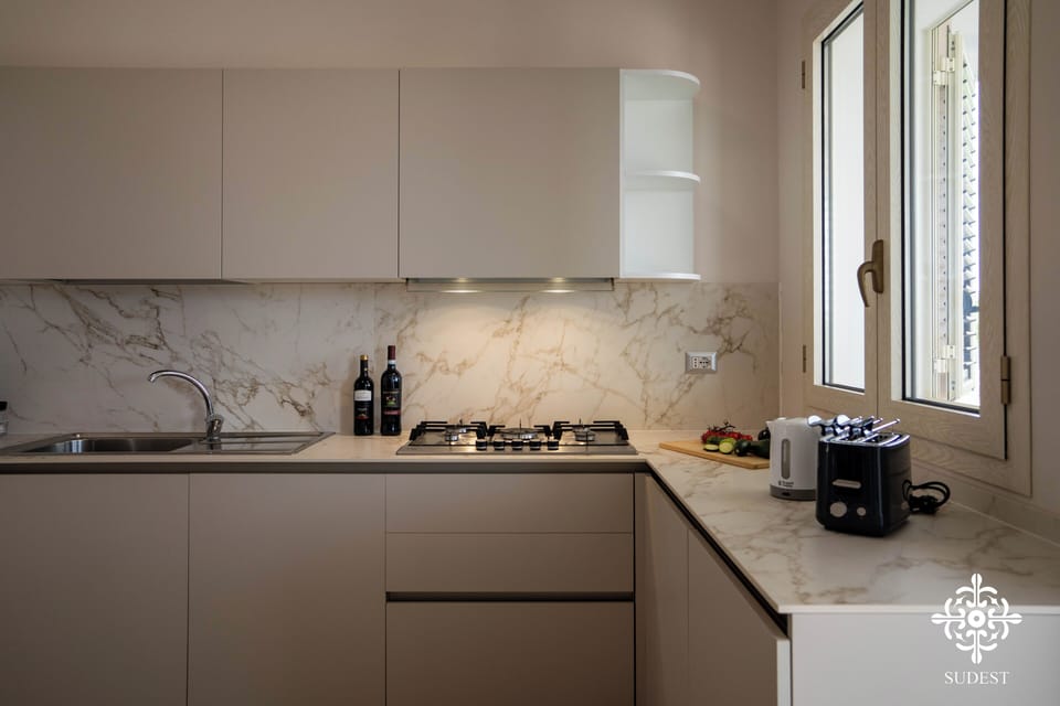 Full-size fridge, oven, dishwasher, espresso maker