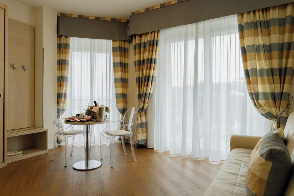 Junior Suite, 1 Queen Bed, Balcony, Sea View (with Two Single SofaBeds) | Living area | TV, DVD player