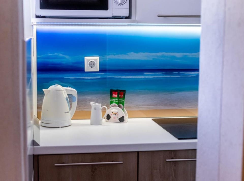 Apartment (Superior One Bedroom Apartment with B) | Private kitchen | Fridge