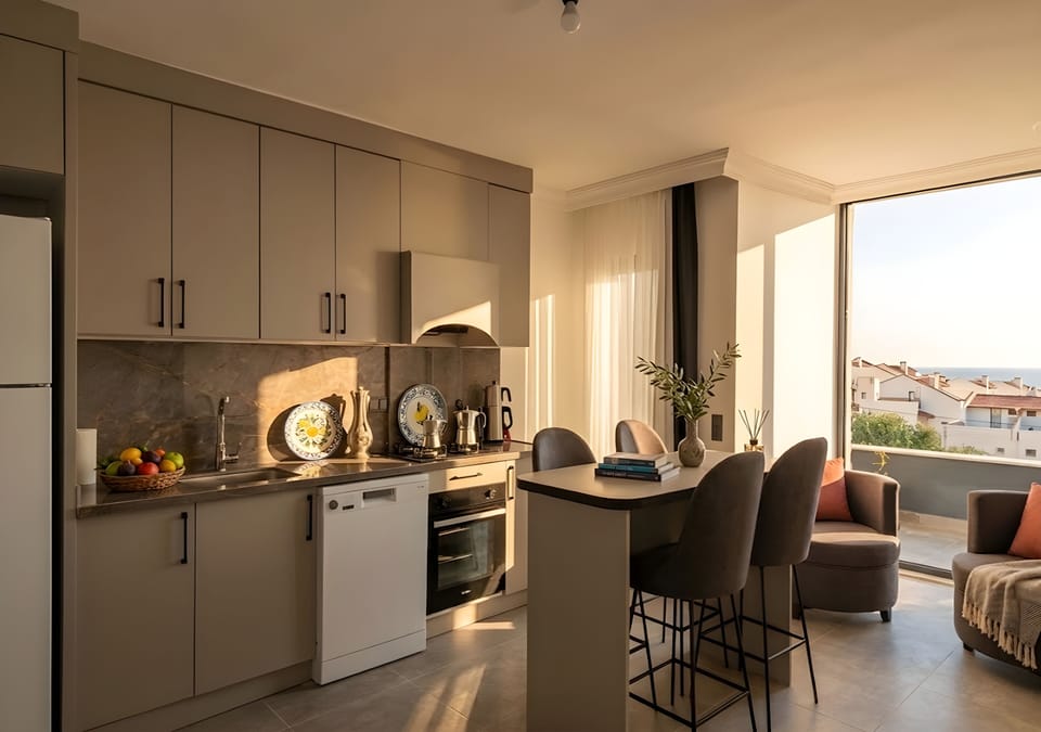 Comfort Suite, Sea View Balcony (2+1) | Living area | 32-inch Smart TV with satellite channels
