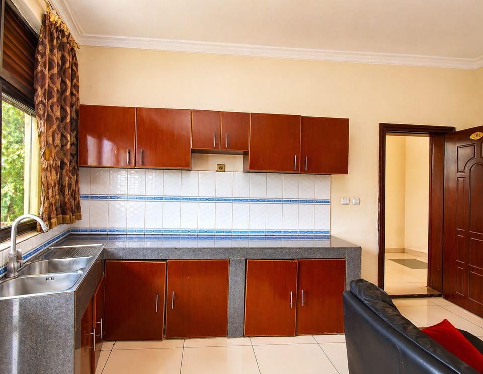 Deluxe Studio, 1 King Bed, Balcony, City View | Private kitchen | Eco-friendly cleaning products, paper towels, dining table
