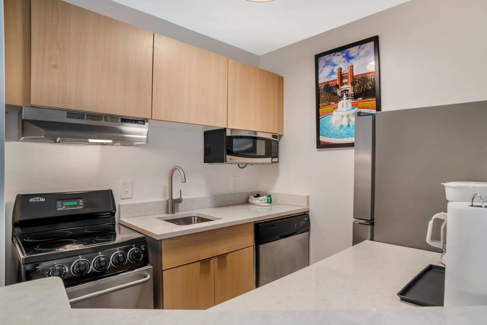 Suite, 1 Queen Bed with Sofa bed, Non Smoking | Individually furnished, desk, laptop workspace, iron/ironing board