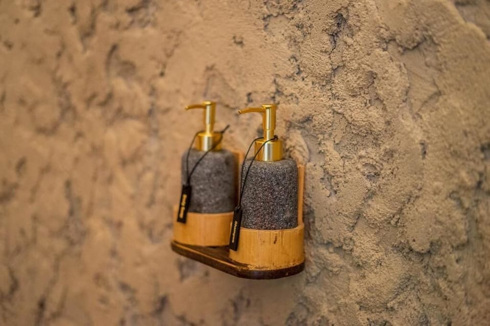 Exclusive Villa, 1 King Bed, Balcony, Garden View | Bathroom amenities | Shower, towels, soap, shampoo