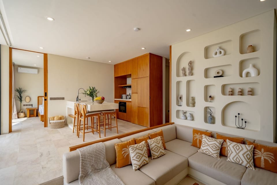 Deluxe Villa, 2 Bedrooms, Patio, Pool View | Living room | 50-inch TV with cable channels