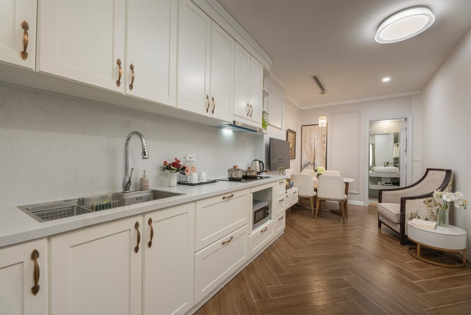 Superior Apartment, 2 Bedrooms, Balcony | Private kitchen | Microwave, highchair, cleaning supplies, paper towels