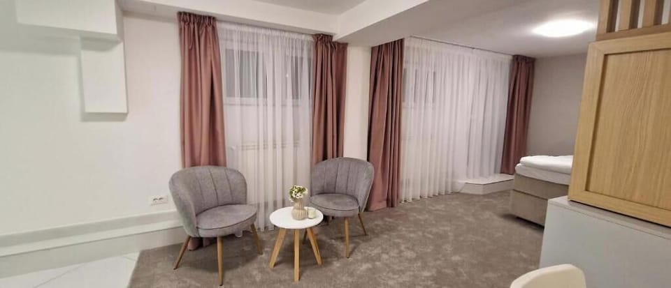 Deluxe Apartment, Patio | In-room safe, soundproofing, iron/ironing board, free WiFi