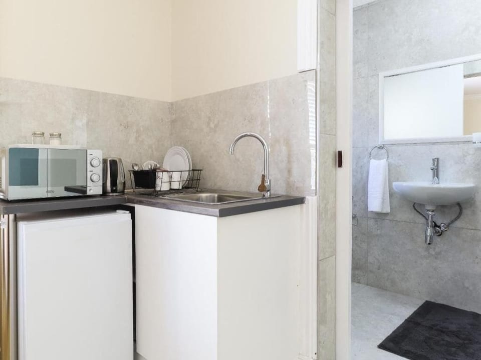 Mini-fridge, microwave, cookware/dishes/utensils