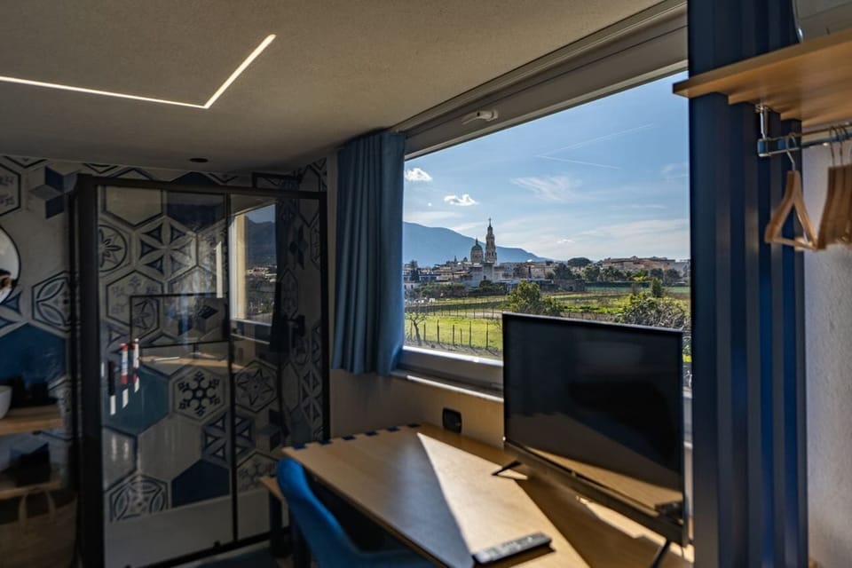 Double Room, 1 Queen Bed, Private Bathroom, Mountain View | Desk, laptop workspace, blackout drapes, iron/ironing board