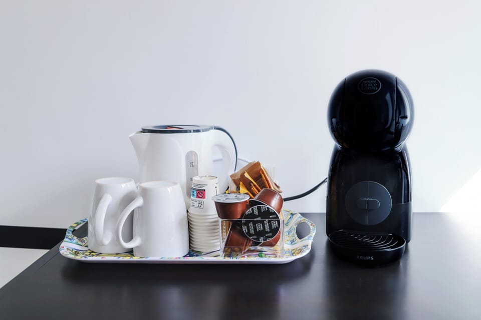 Oven, espresso maker, coffee/tea maker, cookware/dishes/utensils
