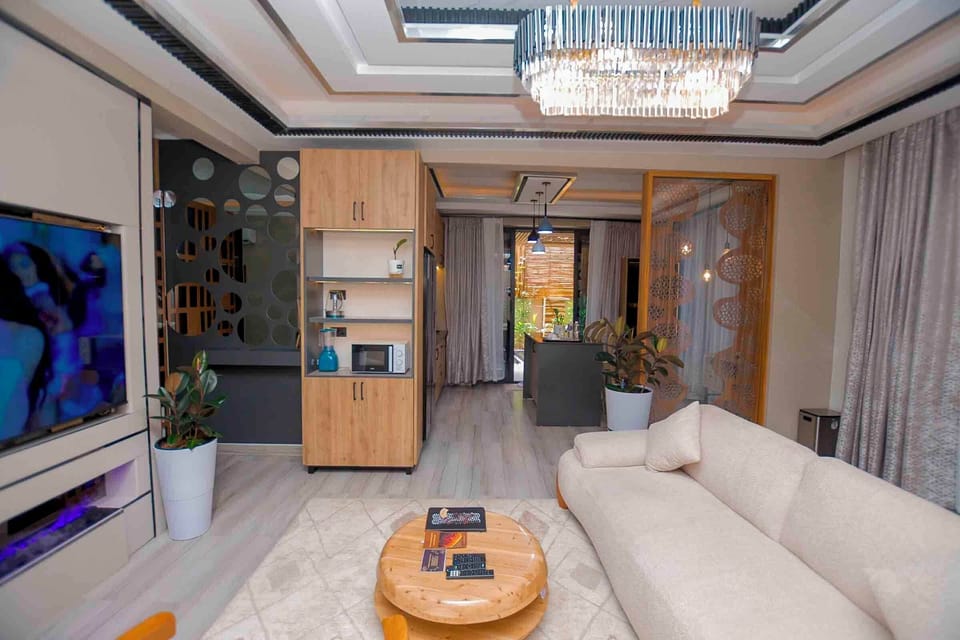 Executive Apartment, 1 Bedroom, Garden View | Living area | TV