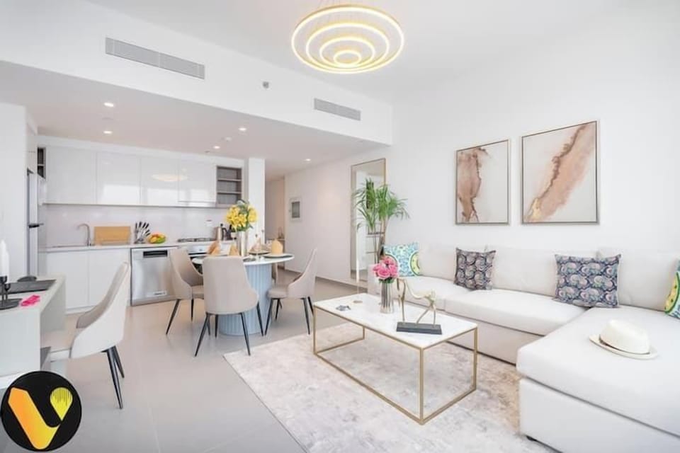 Luxury Apartment, Balcony, City View | Living area | 65-inch Smart TV with cable channels