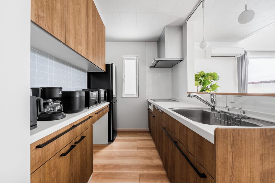 Apartment | Private kitchen | Fridge, microwave, stovetop, dishwasher