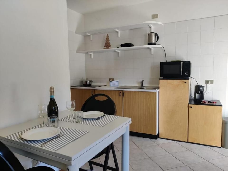 Apartment, Garden View | Living area | 23-inch Smart TV with cable channels