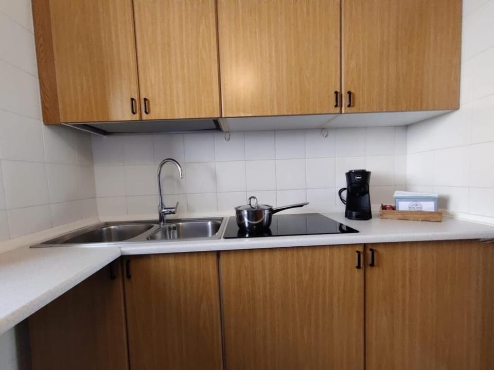 Apartment, Balcony, Mountain View | Private kitchen | Coffee/tea maker, highchair